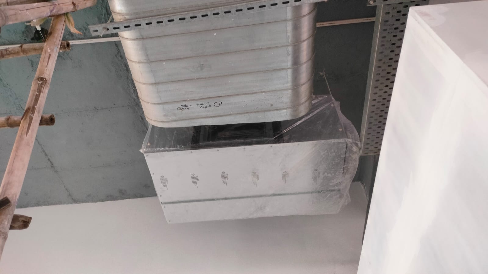 A white box illuminated by a soft light on top, creating a warm and inviting atmosphere.